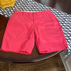 Mens chino shorts in carnation pink/red color, size 30.  Made by Tailorbyrd.